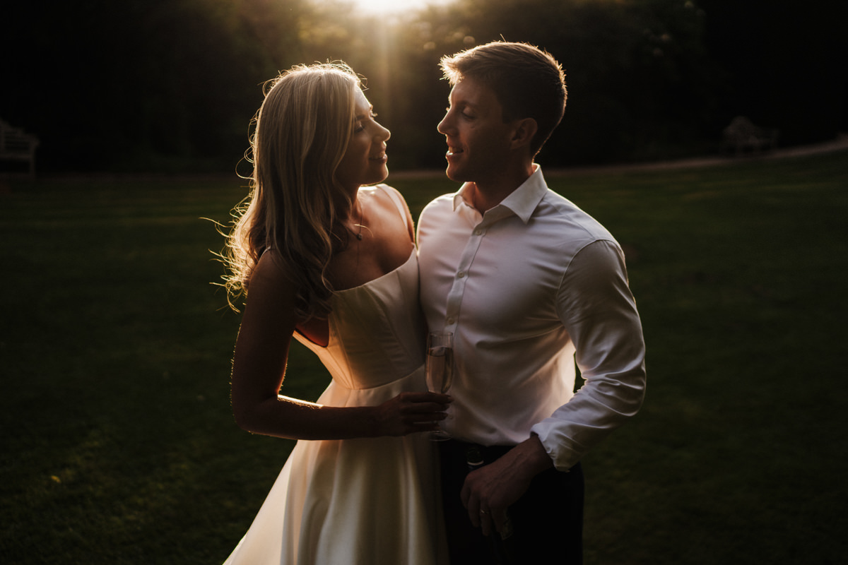 Luna Weddings Devon bride and groom in beautiful light at a the Kingston Estate